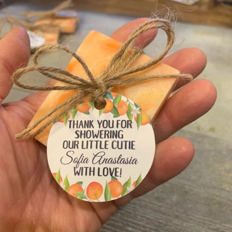 Orange Themed Mini Soap Shower Favors wrapped with tags "Thank you for showering our little Cutie" custom soaps gifts for party guests